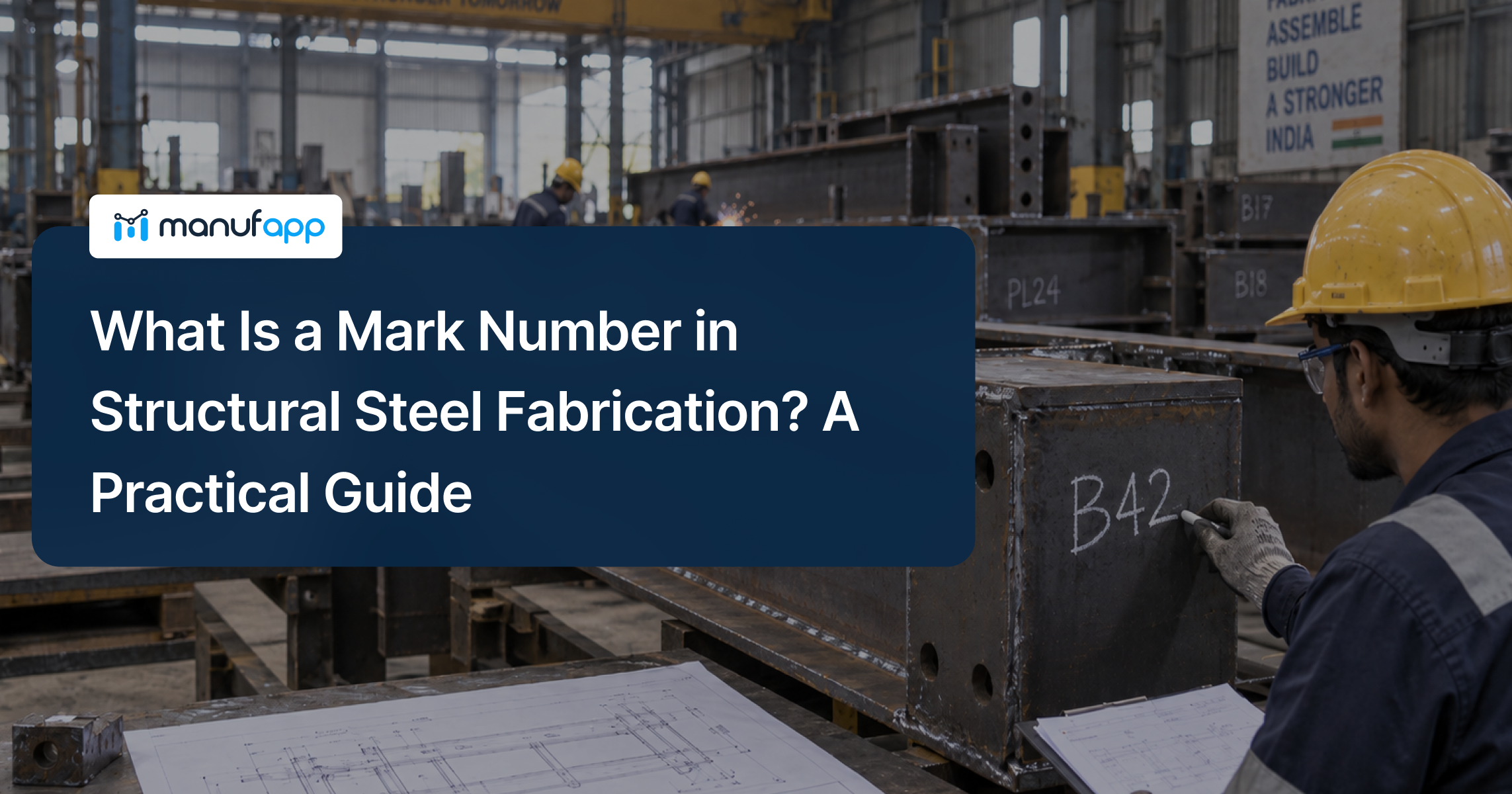 Structural steel member marked B42 during fabrication in a steel workshop